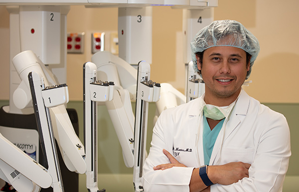 Doctor Montes posing in an operating room